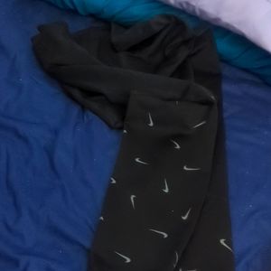 Black with gray check marks Nike leggings